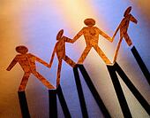 Cut+out+paper+dolls+holding+hands