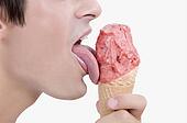 close-up-of-a-man-licking-an-ice-cream-stock-photography__gcr155313205.jpg